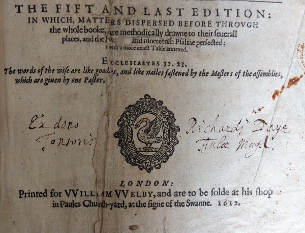 Close up of printed title page of book with handwritten 'ex dono Richard Daye tonsoris Aulae Magd:'