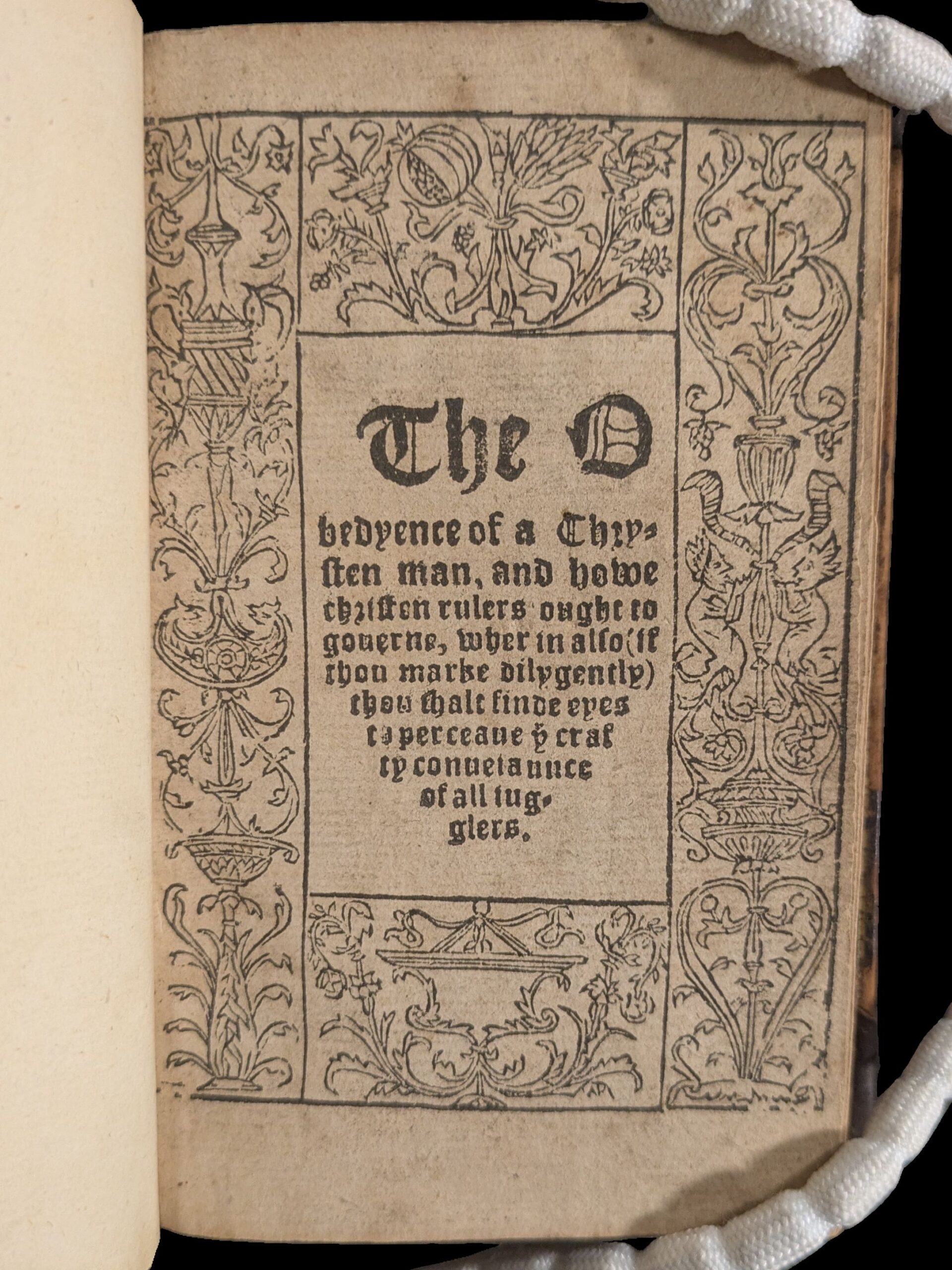 Title page with decorative border and title in gothic script.