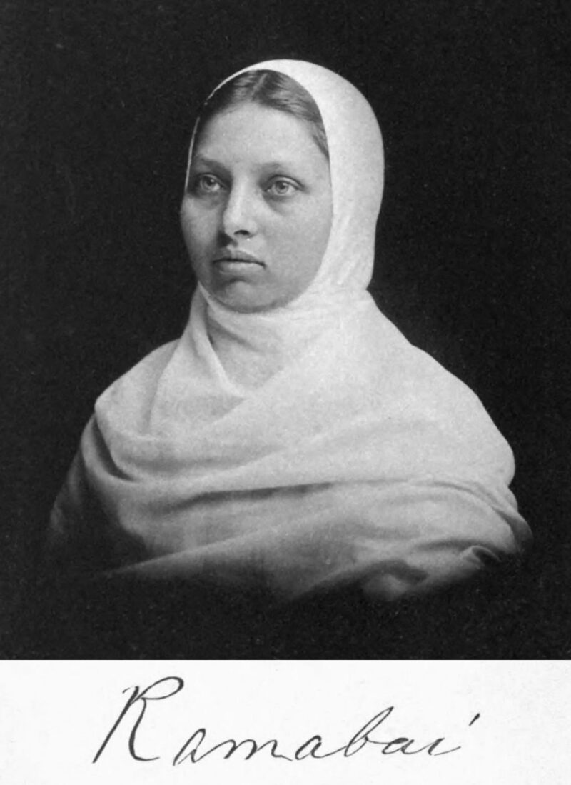 Black and white photo of woman with head covering