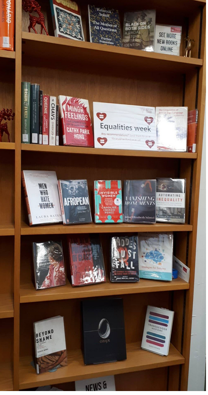 The Equalities Week shelf, displaying a selection of books, in Hertford College Library during Equalities Week.