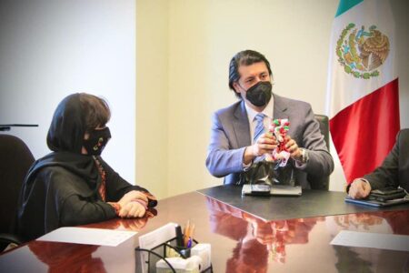 Image of Dr Cristopher Ballinas Valdés (DPhil in Politics, 2003) meeting the Afghan Robotics Team in Mexico City.