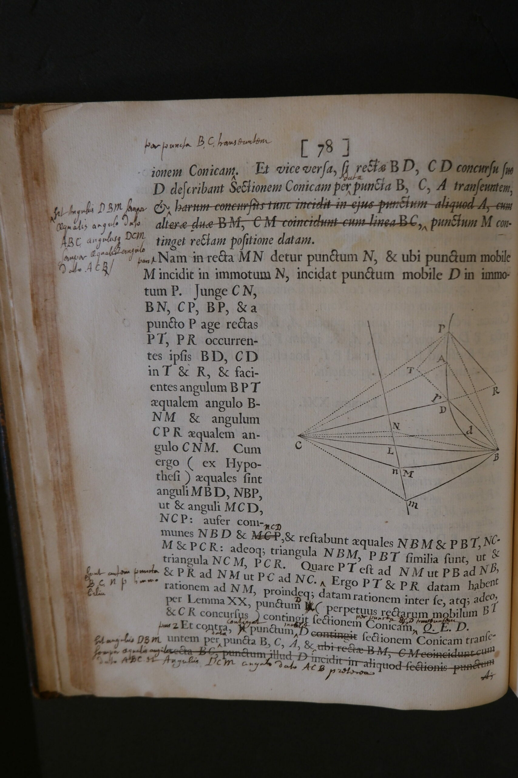 A page from Newton's Principia, with a mathematical diagram and several annotations replacing crossed-out lines.