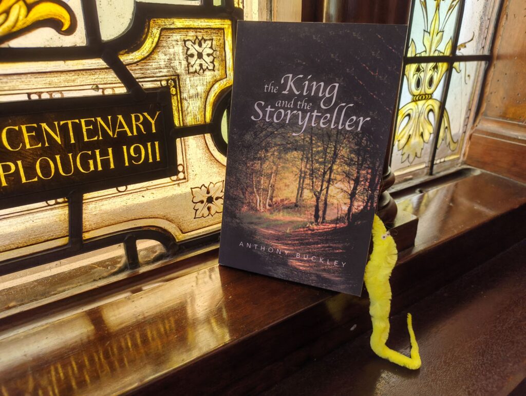 Worm with book The King and the Storyteller in Hertford Chapel